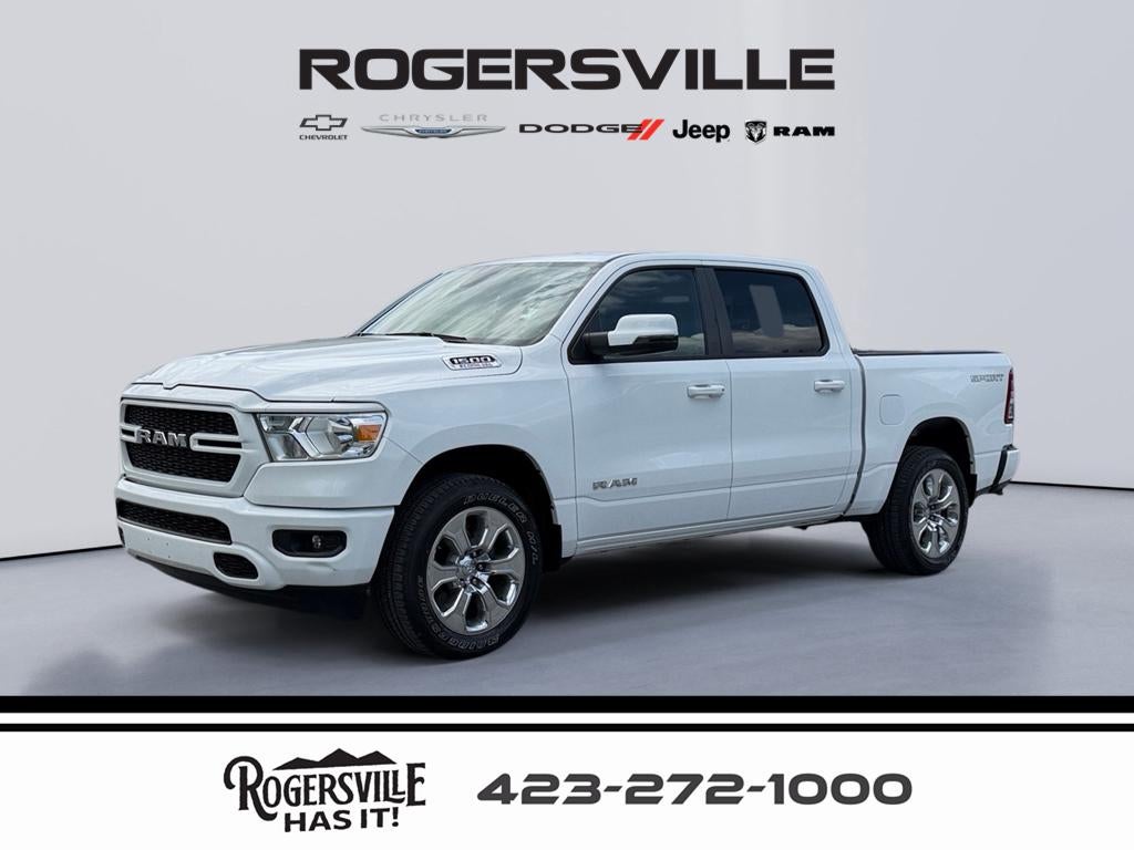2023 RAM 1500 Big Horn in White — front three-quarter view